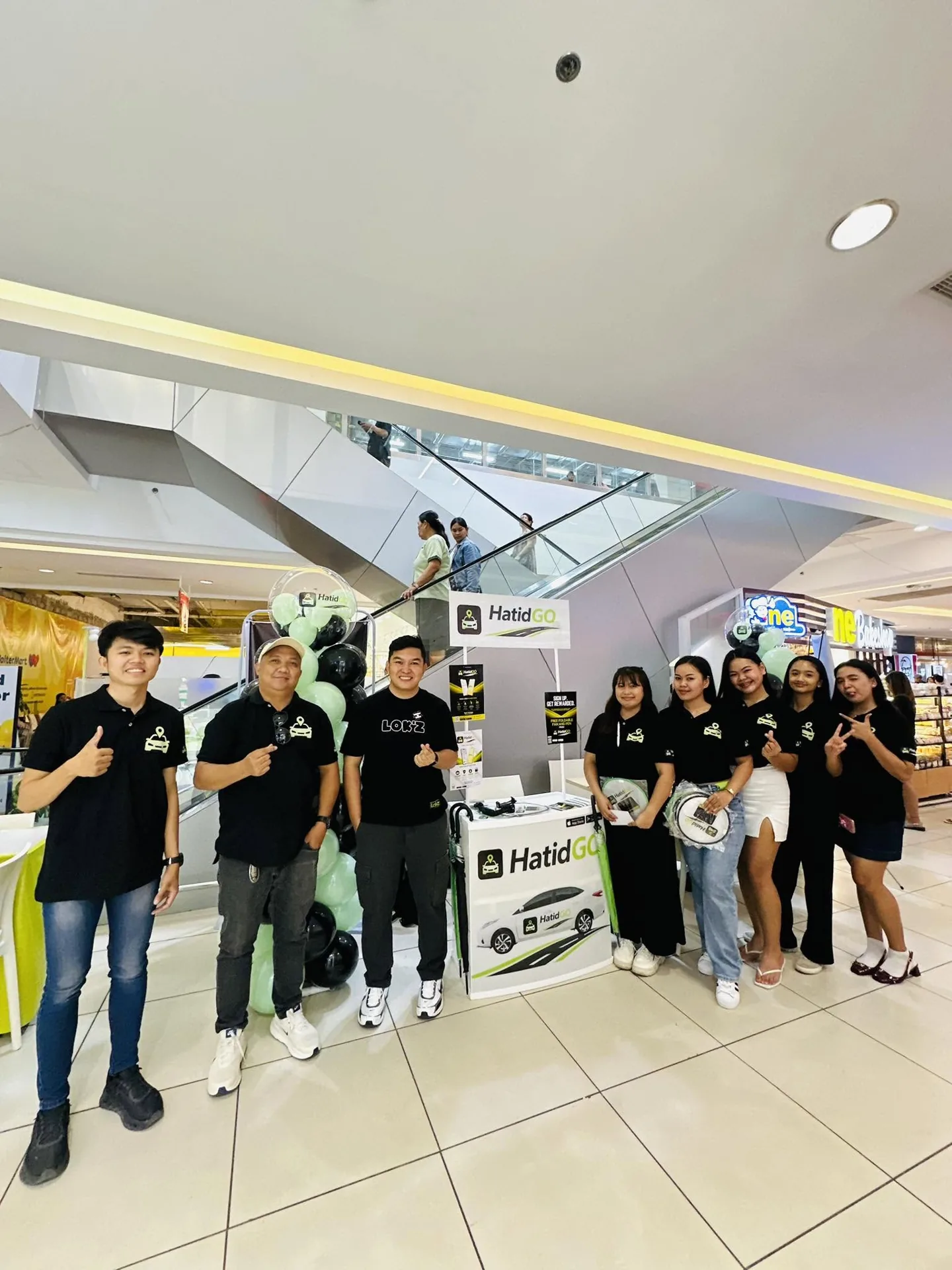 The HatidGo team at their pre-registration booth in the mall